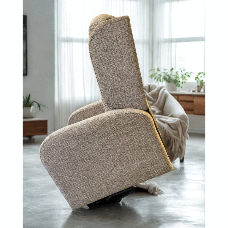 Light brown fabric recliner chair in an upright sitting position, viewed from the side, in a contemporary living room.