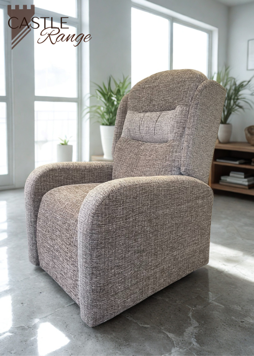 A contemporary rise and recline chair in a light brown fabric with clean lines and subtly curved arms, in a bright, modern room.